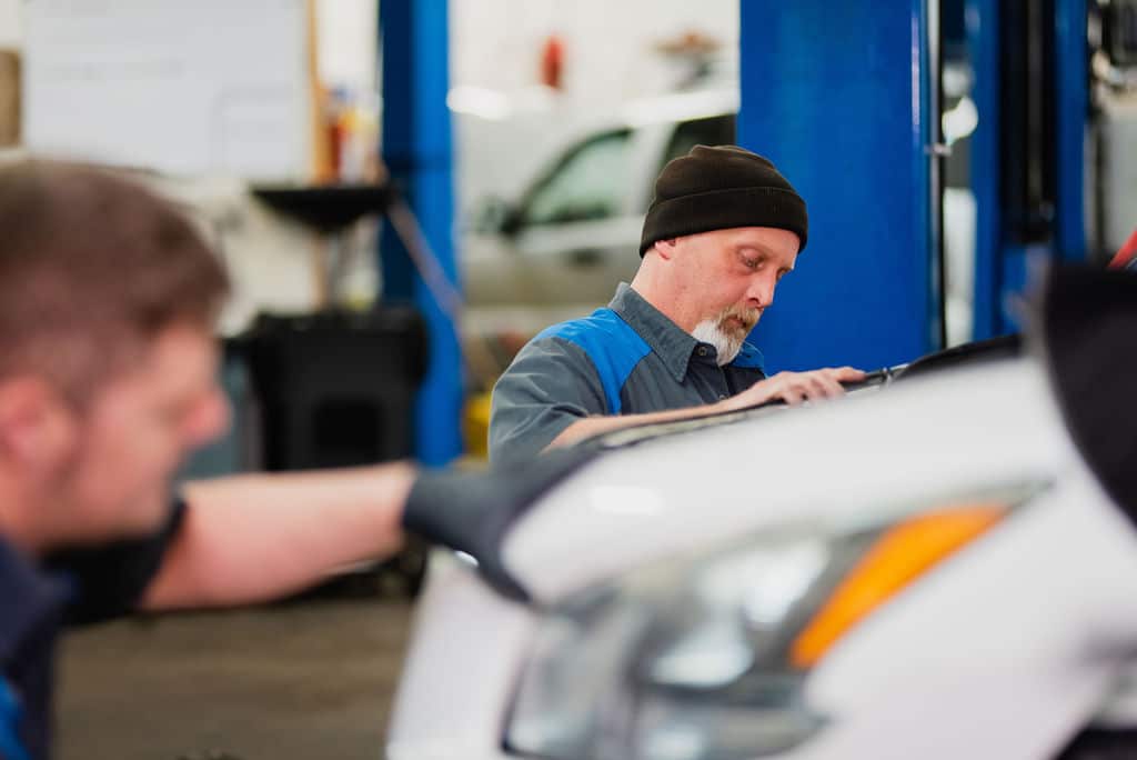 Photo of Mechanic Working on Car at McCormick Automotive Center in Fort Collins, Colorado